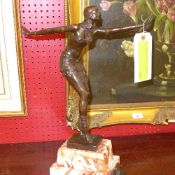 An Art Deco style bronze of a lady dancer on marble stand