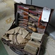 A leather cased set of bygone piano rest