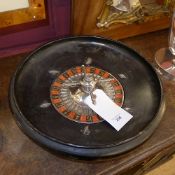 A vintage roulette wheel