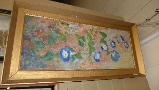 A framed oil on canvas of a still life flower study, indistinctly signed