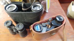 A collection of binoculars two cased