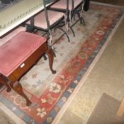 A Chinese style carpet with beige ground