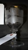 An etched glass goblet with hunting sce