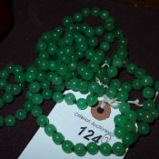 A pair of jadeite necklaces