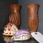 Two treen hand cups with two seashells