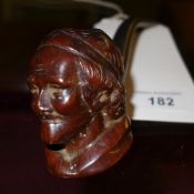 A finely carved hardwood pipe marked DGP