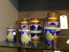 A collection of Royal Lambeth blue glaze