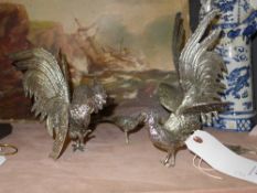 A collection of silver plated cockerels