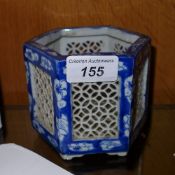 A late C19th Chinese blue and white reticulated brush pot, with prunus blossom. height 9cm