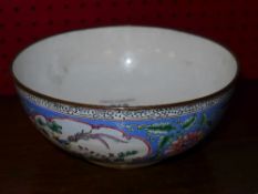A Chinese style bowl with floral and bir