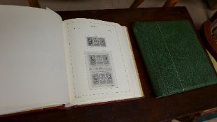 A collection of stamp albums including F