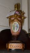 A Sevres style gilt mounted porcelain la
