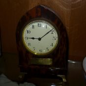 A faux tortoiseshell mantle clock with A