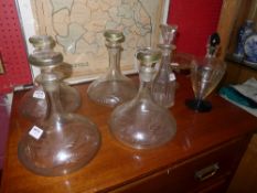 A collection of ships decanters and stop