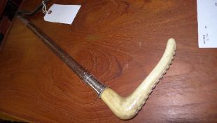 A riding crop with silver collar N.Palmer from K & A Lyne 1937