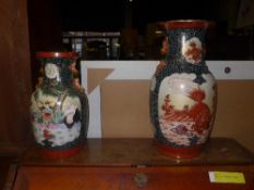 Two Oriental porcelain vases with pictorial panel