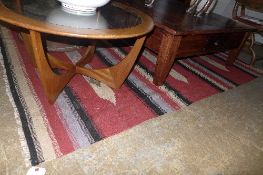 A Moroccan style rug with a multi-colour