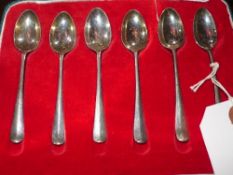 A set of six hallmarked silver spoons (a