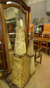 A pair of wrought iron and vellum lights