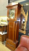 A large mahogany longcase clock with bra