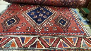 A fine South West Lori carpet , 280 cm x 164cm, bearing triple pole medallion in a terracotta