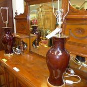 A pair of Sang de Boeuf table lamps