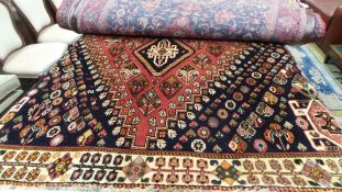 An extremely fine South West Persian Qashgai carpet, 270cm x 170cm, triple pole medallion on a