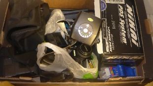 A collection of various 35mm film cameras including Konica and Asahi Pentax