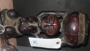 A C19th carved tribal figure, possibly Yoruba