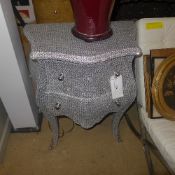 A pair of diamondite commodes