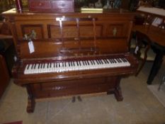 A Bluthner, Leipzig upright iron frame piano