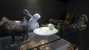 A collection of animals including frogs, monkeys, and others