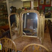 An early C20th gilded triple plate table top dressing mirror