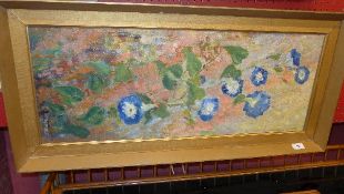 A framed oil on canvas of a still life flower study, indistinctly signed