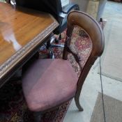 A set of Victorian mahogany chairs with upholstered seats