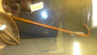 A Malacca walking stick with burr walnut handle and 12ct gold collar
