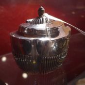 A Georgian style hallmarked silver tea caddy
