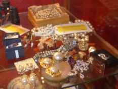 A quantity of costume jewellery including two silver and semi precious stone inset pendants