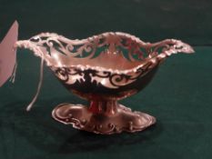 A hallmarked silver sweetbread basket with pierced decoration