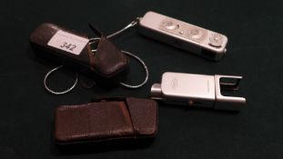A Minox spy camera in good working order and the matching flash