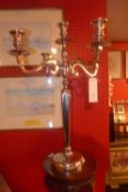 A pair of silver plated five branch candelabra