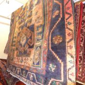 A fine North West Persian Heriz rug 208 x 150 cm repeating geometrical motifs within geometrical
