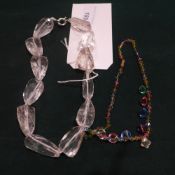 A polychrome crystal necklace circa 1920 and a contemporary similar