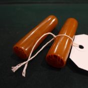 A pair of amber coloured Chinese soapstone seals of cylindrical form