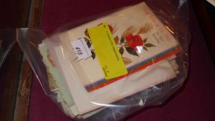 A collection of fifty vintage postcards