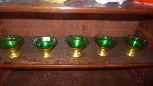 A set of five American 1950's green glass sundae dishes