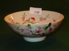 A Jia Qing famille rose porcelain bowl decorated with peaches and bats