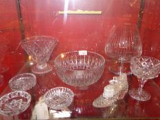 A Stuart crystal vase together with a crystal fruit bowl, crystal coasters, cruet set incorporated