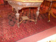 An extremely fine North Persian Turkoman carpet, 280cm x 197cm, repeating tekkeh goul motifs with