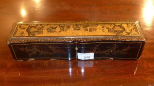 A C19th Chinese carved ivory and silk fan with silver mounts in a black lacquered box with painted